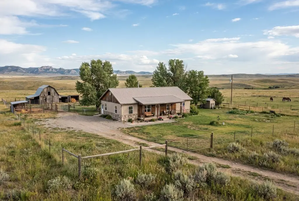 Rural Montana home surrounded by open prairie near Winnett